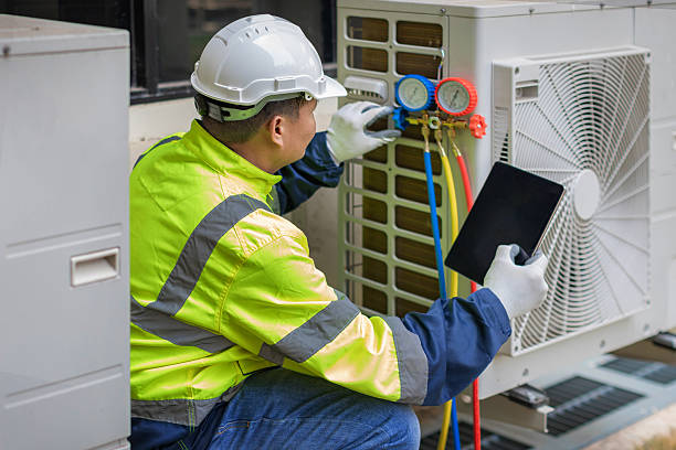 Professional Ac Installation technician working in Hartman, AR